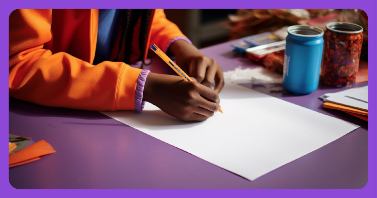 Child practicing writing on paper with a Kasuku pen.